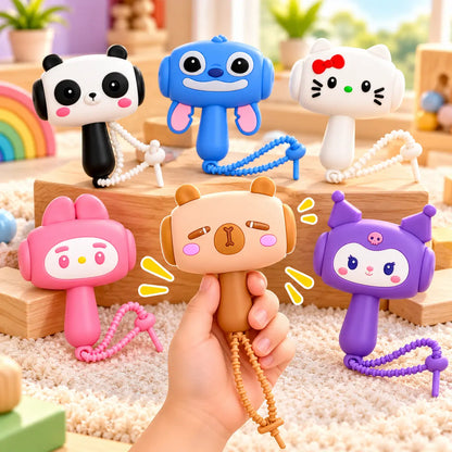 Cartoon animal musical hammer keychain toy with a cute character design