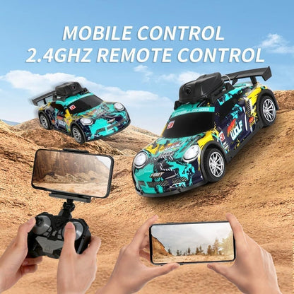 Two remote control cars on a desert landscape with a smartphone and controller in use.
